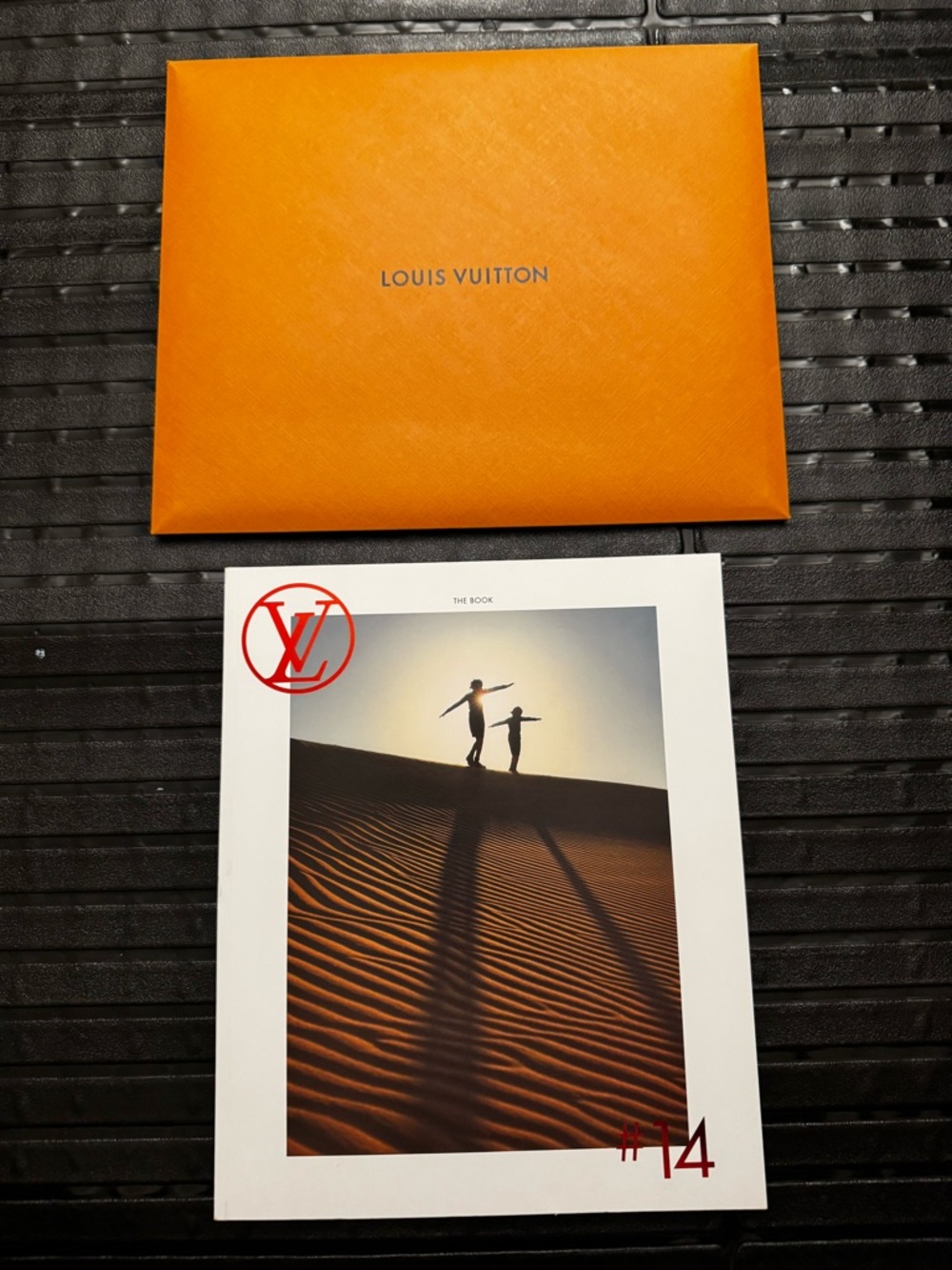 Louis Vuitton Orange Envelope with Branded Booklet